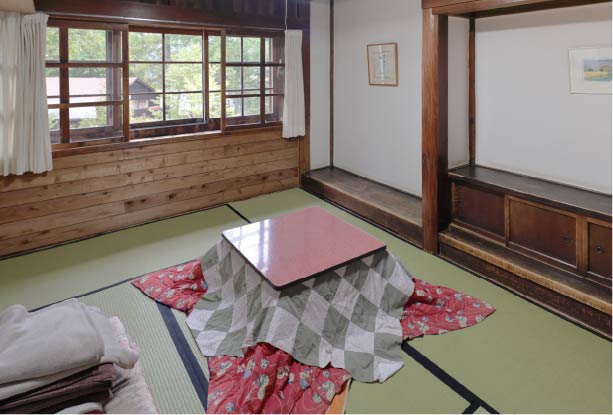 Private bedrooms equipped with a unique Japanese heating system called a kotatsu.